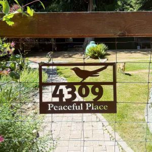 House numbers sign with bird